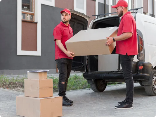 Appleby Moving professional carrying boxes during residential move
